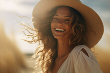A Beautiful Woman Smiling On The Beach Wearing A Straw Hat