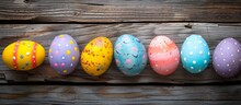 Beautifully Painted Easter Eggs Displayed On A Rustic Wooden Surface