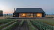 Nestled a fields of wheat and rows of vegetables this minimalist homestead stands out as a peaceful retreat. The sleek functional design of the farmhouse is mirrored in the