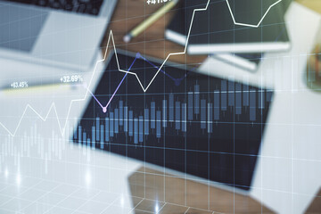 Poster - Multi exposure of abstract creative financial graph and modern digital tablet on background, top view, forex and investment concept