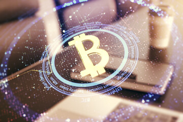 Poster - Double exposure of creative Bitcoin symbol with modern laptop on background. Cryptocurrency concept