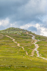 Wall Mural - mountain peak with trails on the mountain side