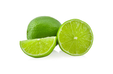 Wall Mural - whole and half with slice of fresh green lime isolated on white background