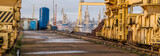 Fototapeta Maki - the quay of the ship repair yard including cranes