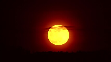 Wall Mural - moving clouds on the background of the moon