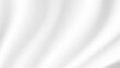 © danai - Abstract background, luxurious white fabric or fluid waves or folds of satin silk background. White silk fabric.