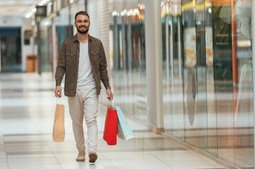 Man is shopping in the supermarket