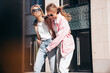 © halayalex - Two young beautiful smiling hipster female in trendy summer clothes. Carefree women posing in the street. Positive models having fun outdoors . Cheerful and happy. In  sunglasses. Crossing road