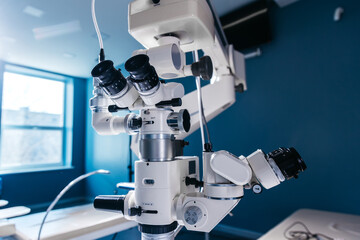 Wall Mural - Interior of a modern ophthalmology operating room with modern equipment. The concept of new ophthalmological and modern technologies for vision correction and treatment.