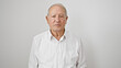 © Krakenimages.com - Senior man standing with serious face over isolated white background