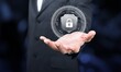 © BillionPhotos.com - Cybersecurity concept icons in business man hand