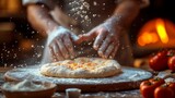Fototapeta Desenie - Artisanal Pizza Creation: Capturing the hands of a chef skillfully stretching pizza dough with flour in the air, conveying the artistry of pizza-making.