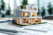 An illustration showcases a modern architectural residential model in a 3D rendering, emphasizing the architectural design concept. Laminated plans are scattered beneath, illuminated by natural light,