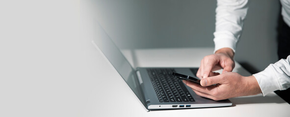 Wall Mural - man using laptop computer on white background