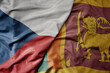 big waving national colorful flag of sri lanka and national flag of czech republic.