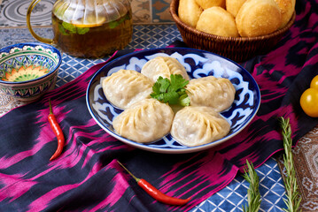 Wall Mural - Manti with tea and bread. Oriental background