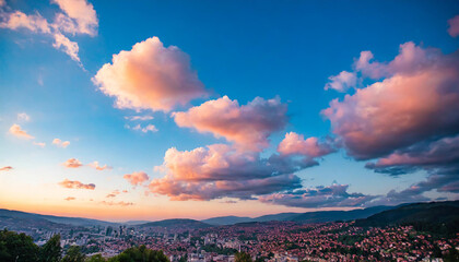 Poster - Pink clouds against a blue sky at sunset, Sarajevo, Bosnia and Herzegovina