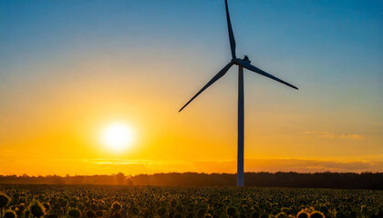 Wall Mural - Wind turbine generating electricity and sunset