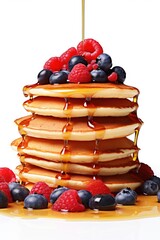 Canvas Print - Mouth-watering stack of pancakes topped with syrup and fresh berries. Perfect for food and breakfast concepts