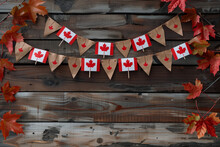 Maple Leaves And Miniature Canadian Flags Arranged On A Rustic Wooden Background, Patriotic Display For Victoria Day