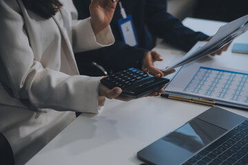 Co working conference, Business team meeting present, investor colleagues discussing new plan financial graph data on office table with laptop and digital tablet, Finance, accounting, investment.