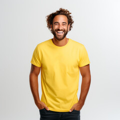 Wall Mural - Smiling men wearing yellow T-Shirt Mockup on black studio background