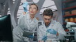 © stockbusters - Professional scientists making research in biotechnology laboratory close up.