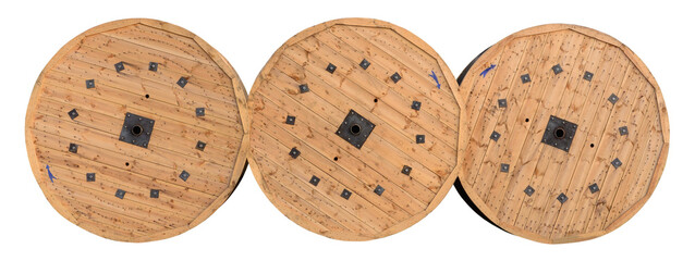 Wooden heavy cable reels, three vintage wood bobbins, electric fiber optic cables drums, electrical wires spools, steel wire cables industry large detailed isolated horizontal closeup white background