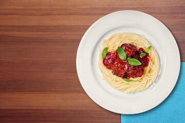 Wall Mural - Spaghetti pasta dish with meatballs in sauce