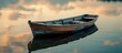 A small vintage wooden rowboat peacefully floats on the calm waters of a serene lake.