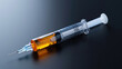 Syringe with yellow liquid on a black background. The concept of vaccination .