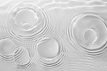 Fototapete - intricate patterns created by water ripples on a surface. The ripples undulate gracefully, creating a captivating visual display