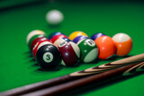 Fototapeta Sypialnia - Many colorful billiard balls and cue on green table