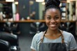 A joyful woman with a stylish hairstyle and a bright smile stands proudly in her shop, donning a sleek black apron as she showcases her fashionable clothing and accessories to potential customers