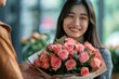 A joyful woman expertly arranges a stunning bouquet of garden roses, her smiling face adorned with artificial flowers and her clothing a beautiful blend of femininity and floristry