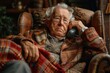 Amidst a sea of wrinkles, a wise old man sits in his chair, clad in his worn clothing, pouring out his heart over the phone