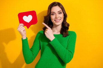 Canvas Print - Photo of adorable cheerful woman dressed green trendy clothes recommend follow blog isolated on yellow color background