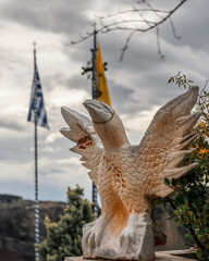 Greek Orthodox Meteora Monasteries near Kalambaka village Thessaly Greece, 2.1.2024, pilgrimage tourism, eagle statue