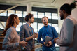 © Drazen - Multiracial group of business people talking in convention center.