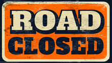Distressed Road Closed Sign On Wood