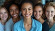 © OKAN - Group of diverse happy women smiling for a portrait together
