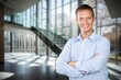 © BillionPhotos.com - Handsome business man smiling in office background