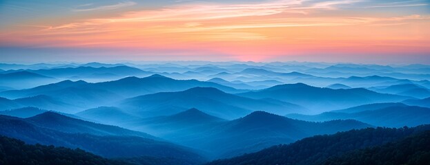 Wall Mural - Hazy mountain ranges layered under soft pink and purple sunrise, fading into misty horizon