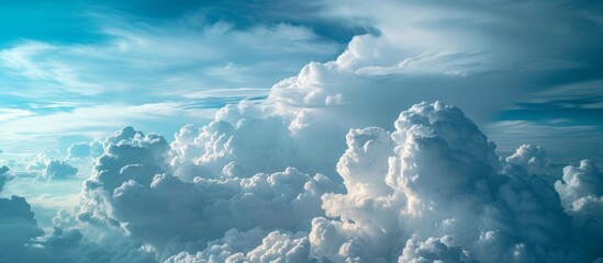Wall Mural - tranquil panoramic view of serene blue sky with fluffy white clouds on a peaceful day