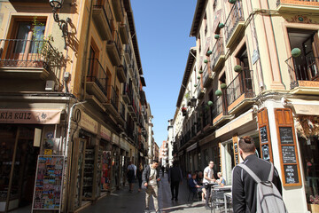 Streets of Spanish cities. the sky through Spanish buildings. Buildings in Spain