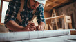 © Justlight - A general contractor meticulously manages the timeline of a home renovation making sure each step of the project is completed on schedule while also communicating any potential