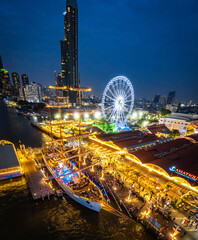 Wall Mural - Aerial view of Asiatique The Riverfront open night market at the Chao Phraya river in Bangkok, Thailand