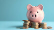© MyBackground - piggy bank with a pile of coins in front of it on a blue background with copy space, an investment concept for collecting money
