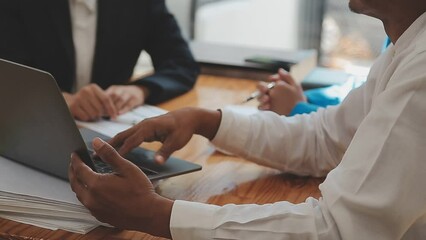 Team of business people are meeting to analyze data for marketing plan,Market research reports and income statistics, Financial and Accounting concept.
