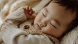ぐっすり眠っている寝顔が天使のように可愛い0歳児の赤ちゃんのアップ、ぷくぷくほっぺ